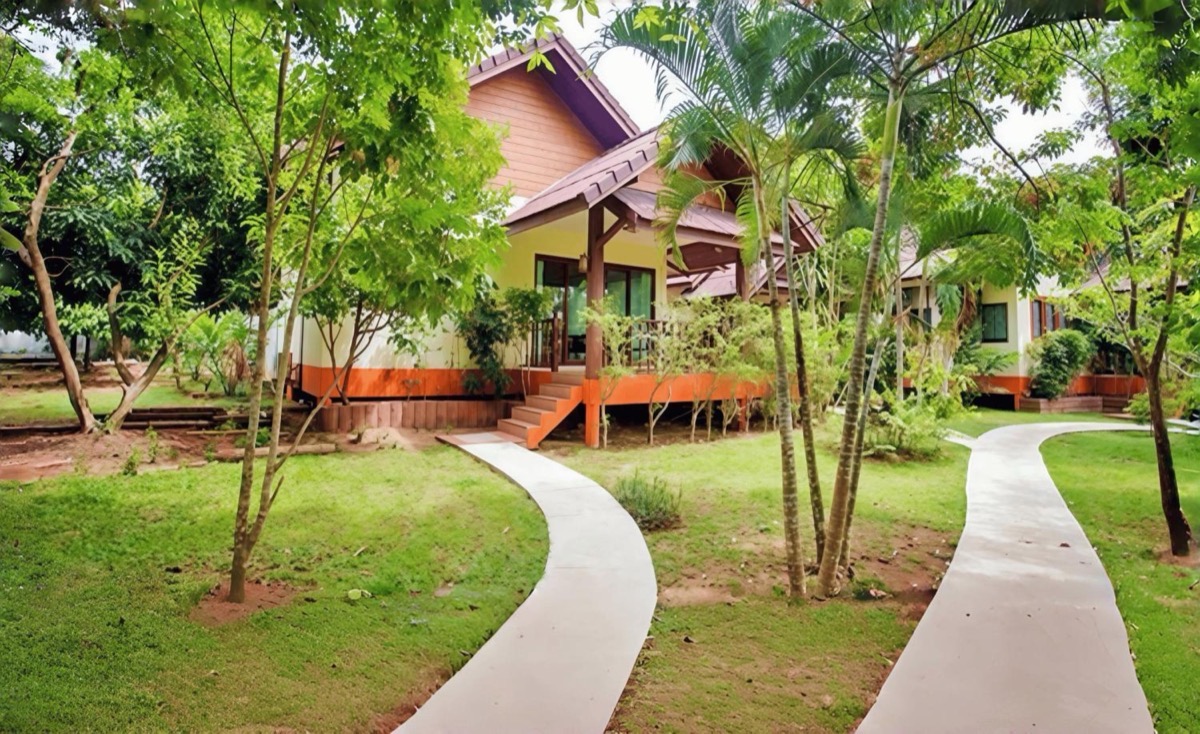 A garden path running between the ground-floor units