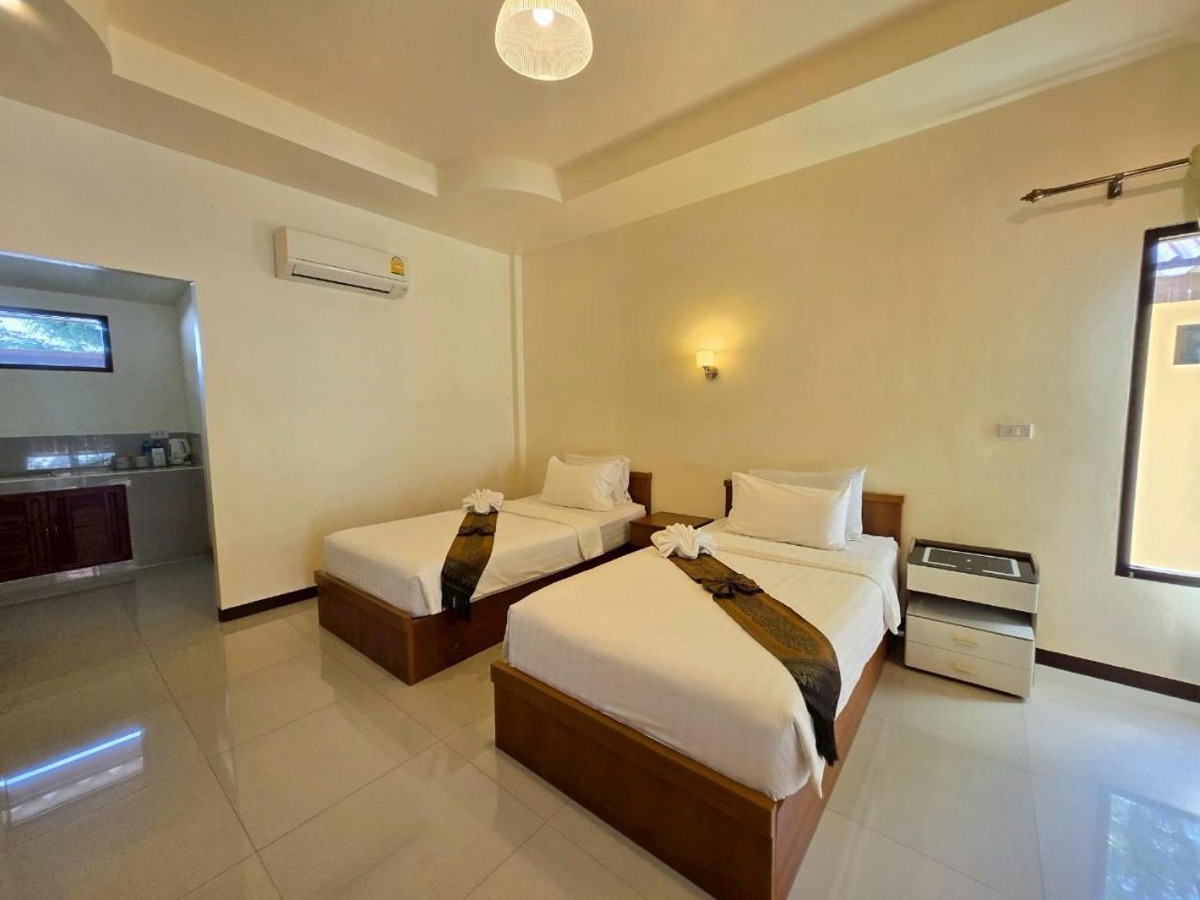 The 50 m² room, with air conditioning above the beds