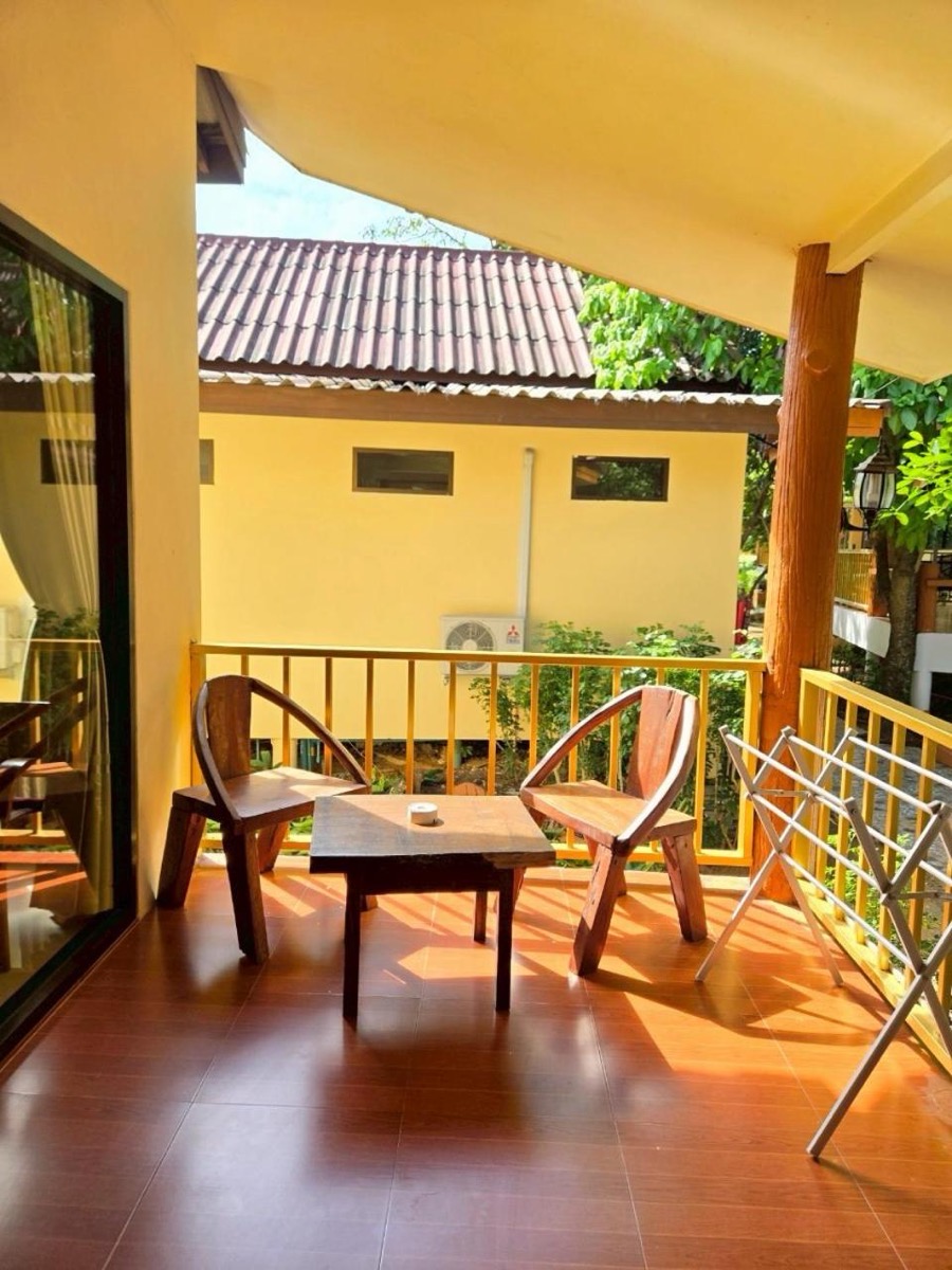 The room's own terrace, with a table and two chairs