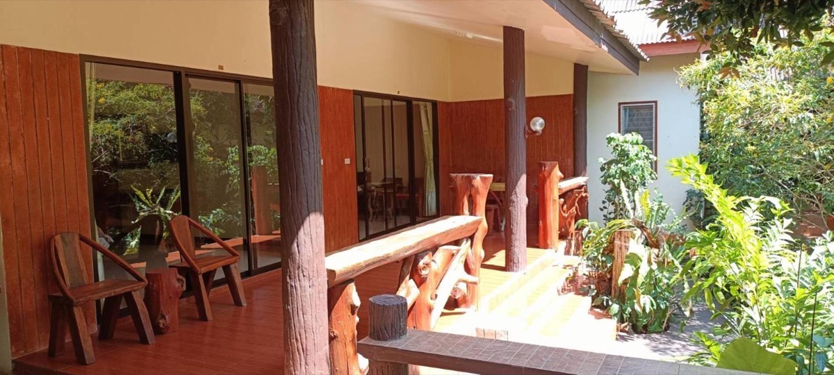 The covered veranda outside the ground-floor rooms